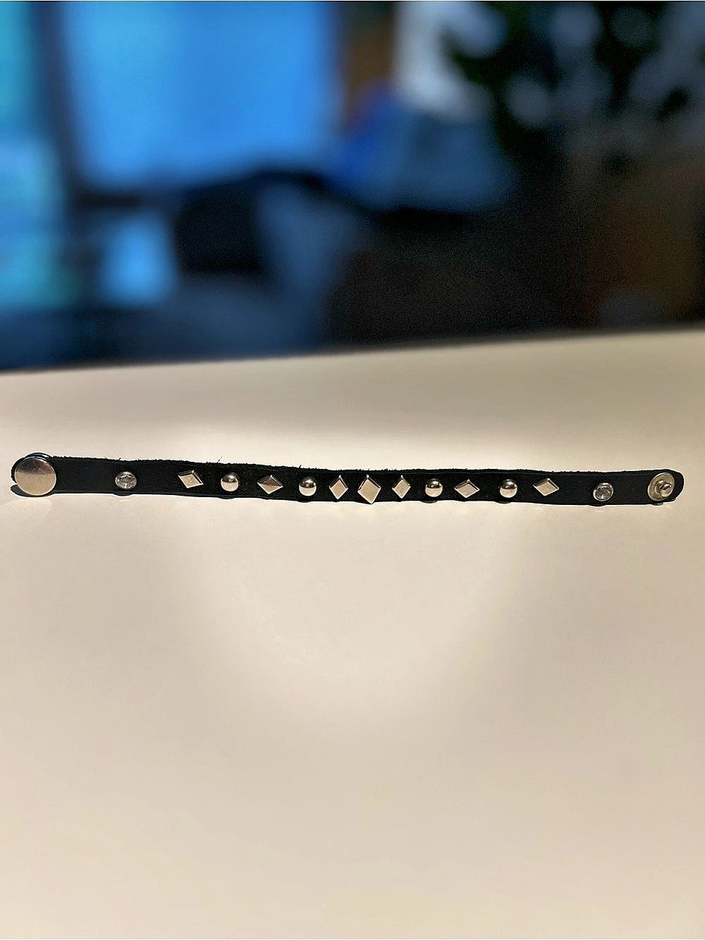 Slim black leather bracelet with round and diamond shaped silver studs - 8” long
